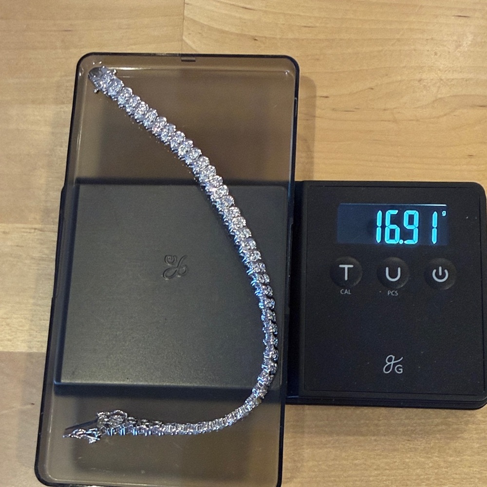 Silver colored tennis bracelet with cz marked 925 magnetic - Picture 2 of 4